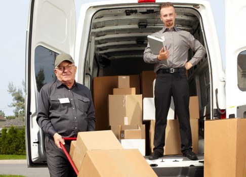 Office desks and equipment prepared for a Soho business relocation