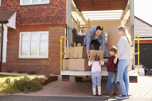 Movers preparing a Soho relocation with careful packing and loading