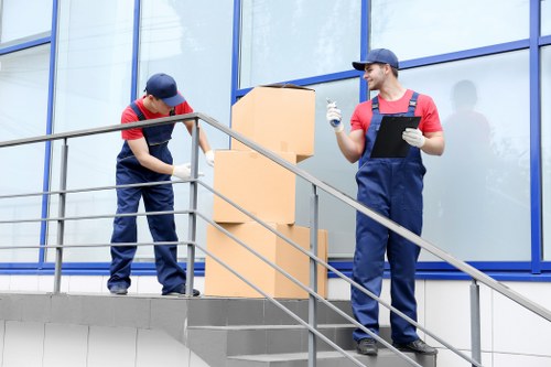Commercial moving team planning a relocation in Soho street access