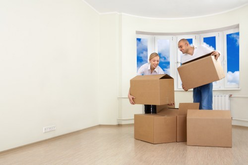 Removal team handling furniture in a central London street