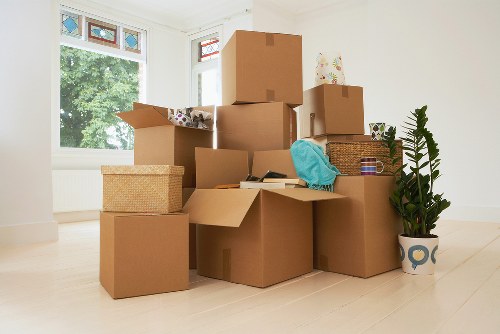 Team handling furniture in a Soho apartment building