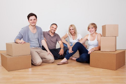 Packed office equipment and furniture prepared for transport in Soho